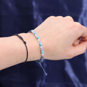 Bougie astrologique Poissons avec bracelet en pierres